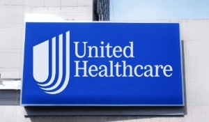 UnitedHealthcare building sign—representing the company at the center of recent Medicare fraud investigations, commission cuts, and consumer trust concerns in 2025.