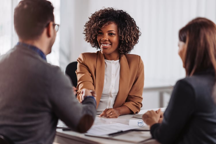 FYInsurance Solutions advisor meeting with business owners to discuss key person coverage and buy-sell agreements, protecting companies from leadership loss due to cognitive decline.