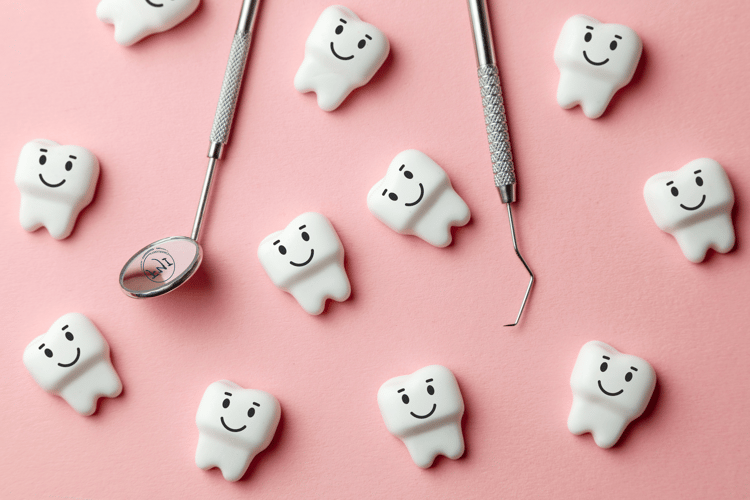 Dental tools and smiling tooth icons on a pink background, representing the link between oral hygiene, brain health, and the importance of dental insurance
