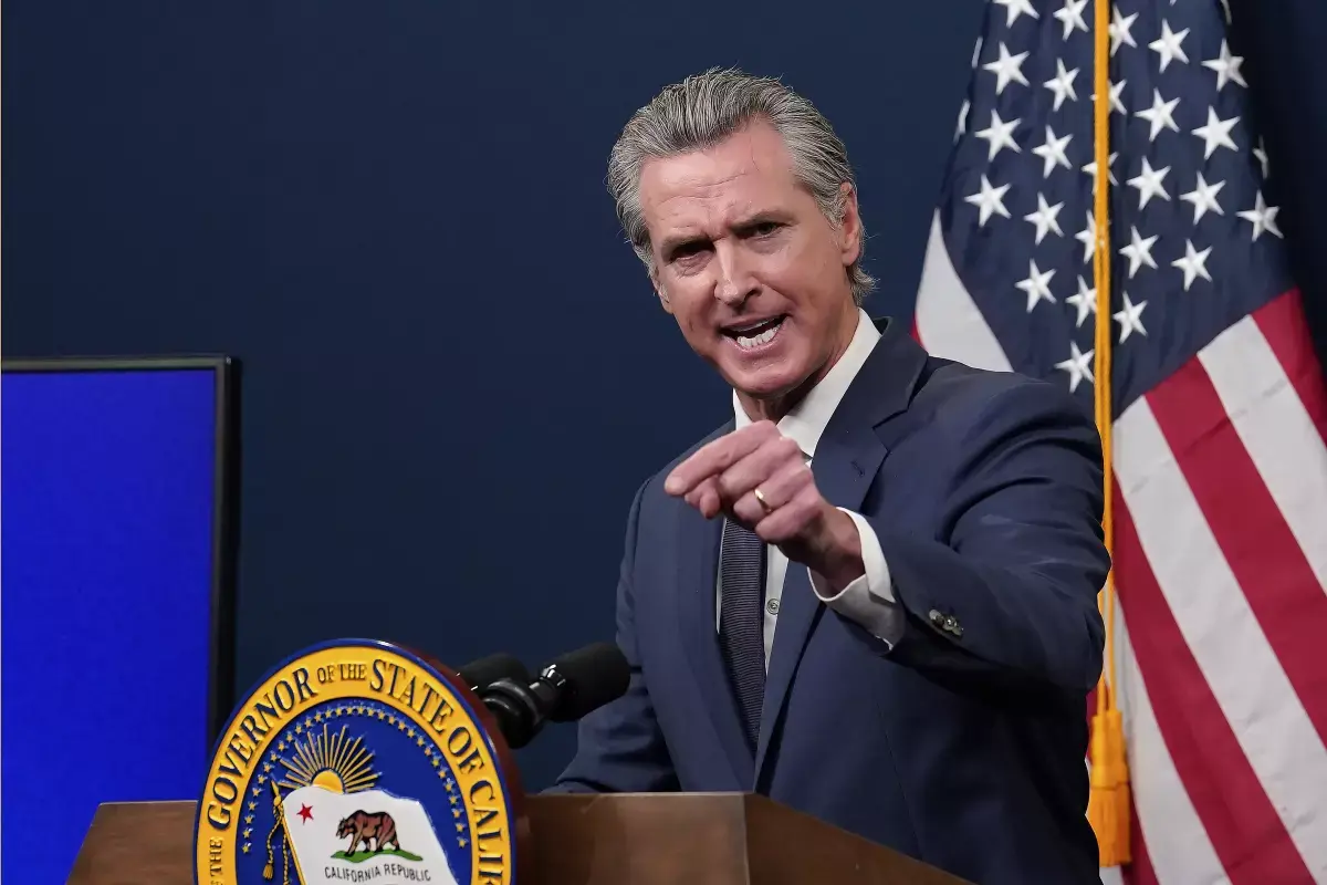 Gov. Gavin Newsom presents his revised state budget during a news conference in Sacramento on May 14. (Rich Pedroncelli / Associated Press)