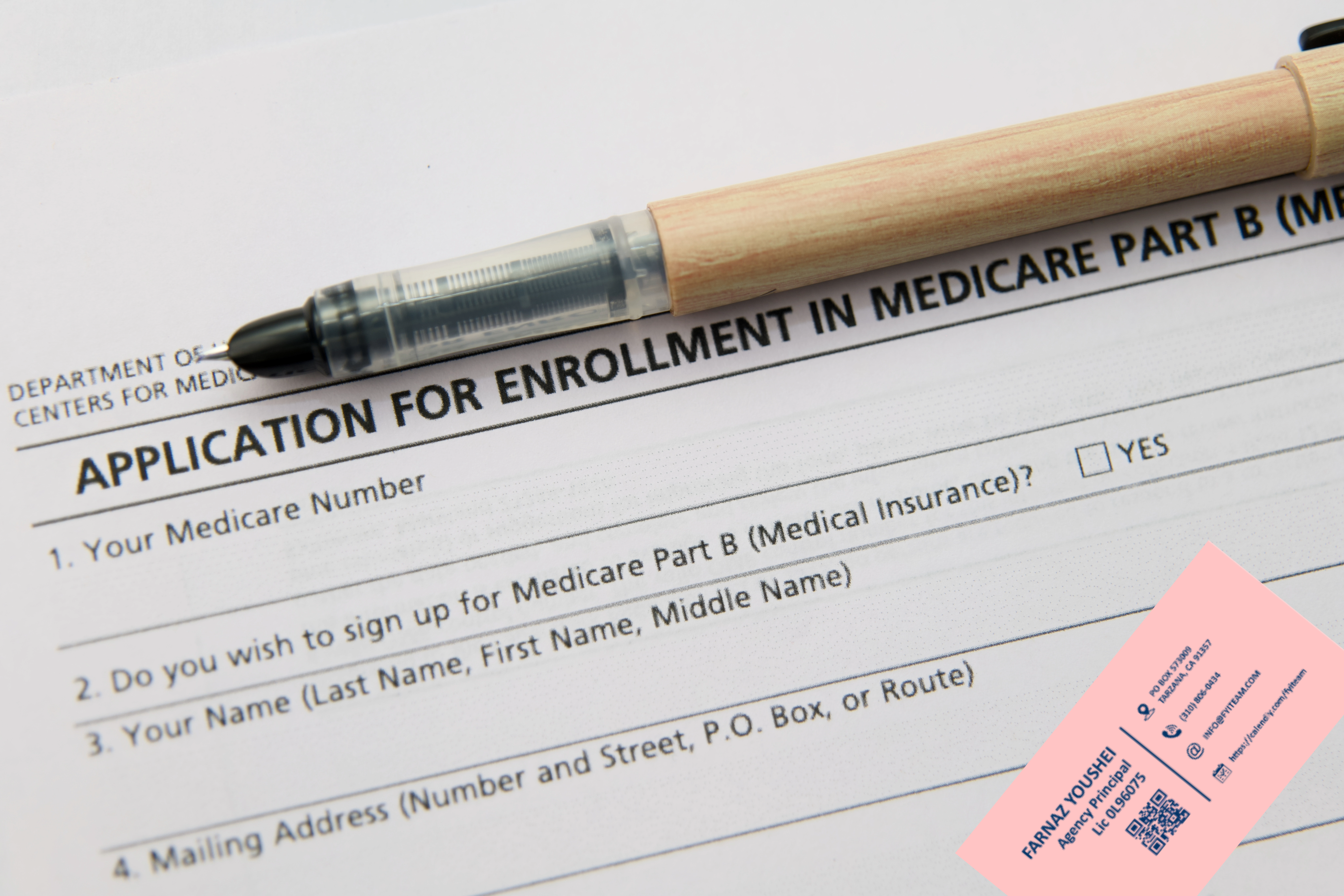 Medicare Part B enrollment form with pen and advisor contact card—highlighting steps to sign up for medical coverage and get help with Medicare planning